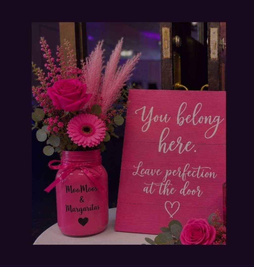 Pink roses and memorial flowers in the garden